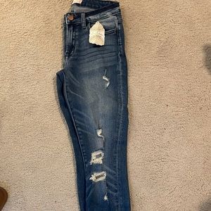 Altar’d State size 27 ripped jeans semi stretchy